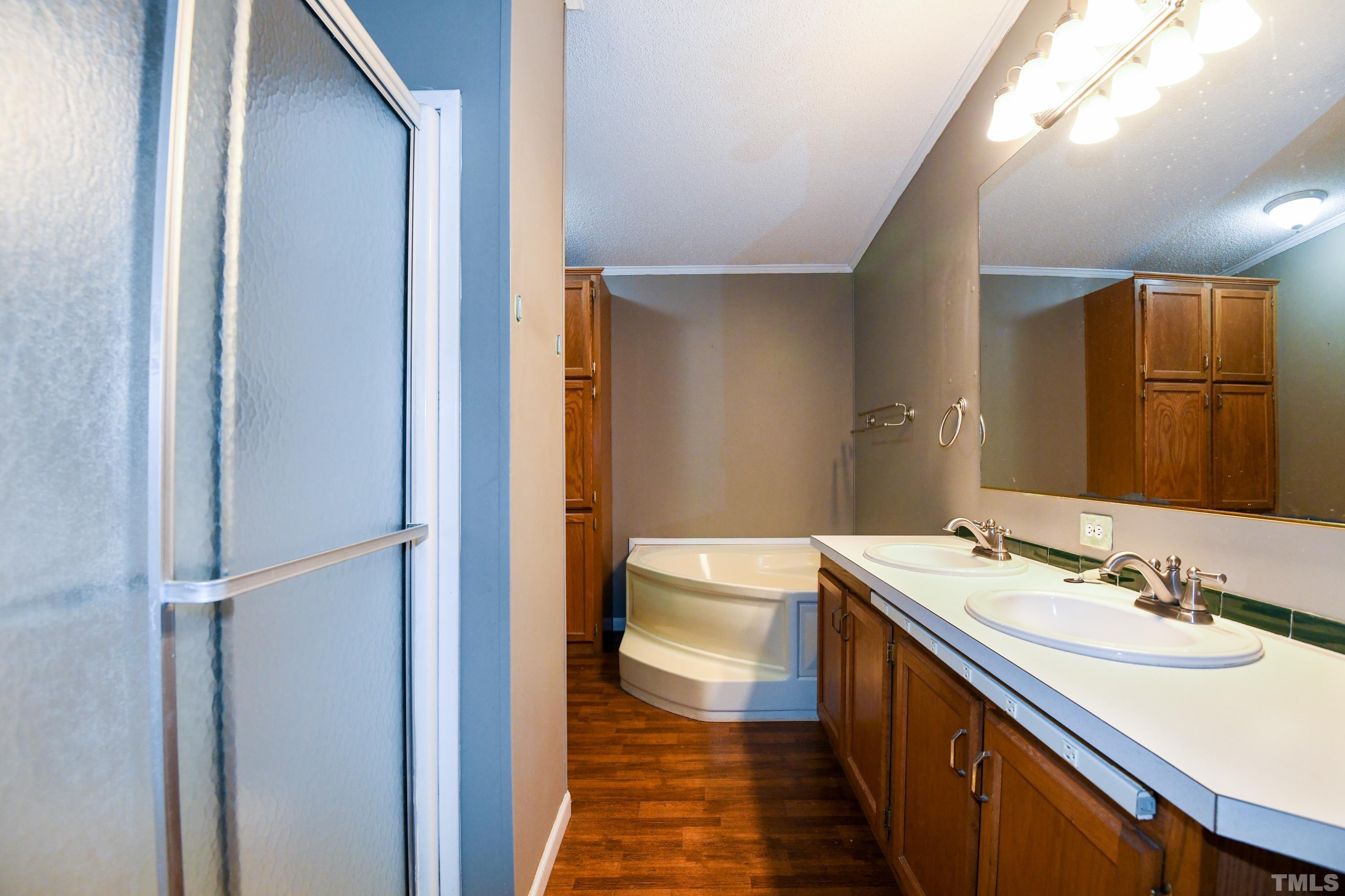 1516 Bill Poole Road Rougemont, NC 27572 - Photo 7 of 17 a bathroom with a sink a toilet and mirror
