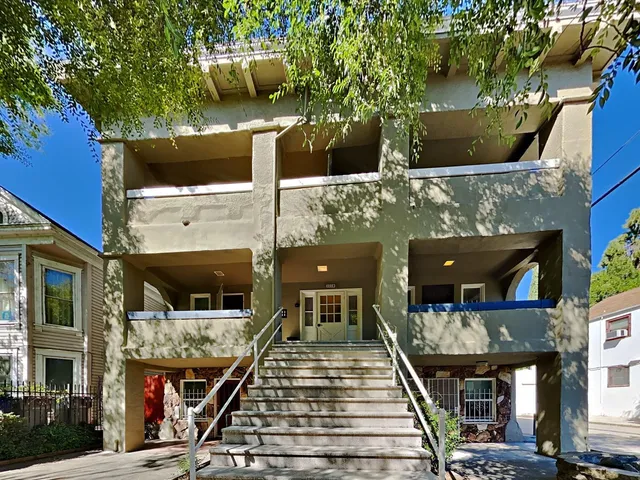 a front view of a building with street