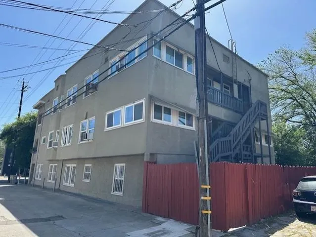 a car parked in front of a house