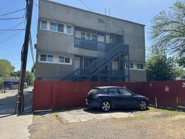 a car parked on the side of the ocean