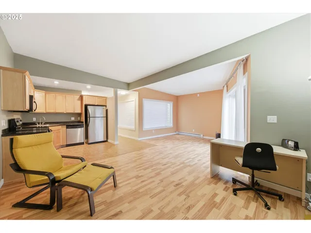 a workspace with furniture and a window