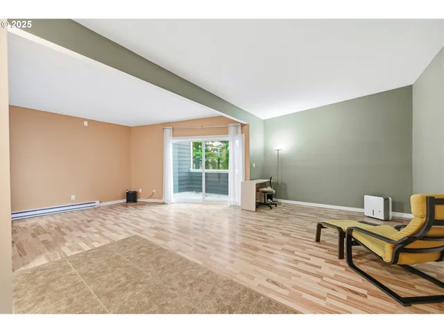 a view of a livingroom with a workspace