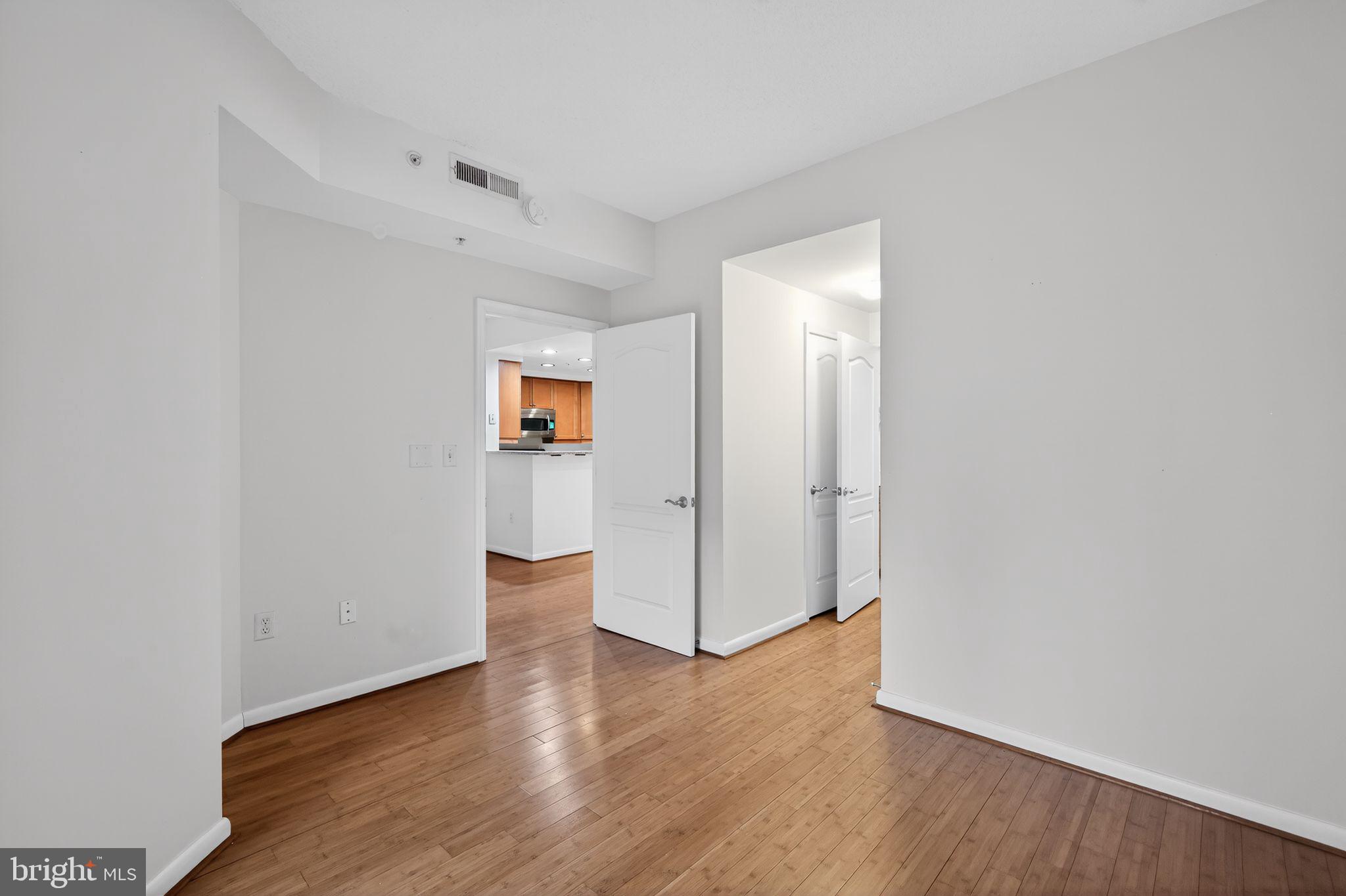 1111 11th Street Northwest, Unit 308 Washington, DC 20001 - Photo 3 of 47 a view of a room with wooden floor