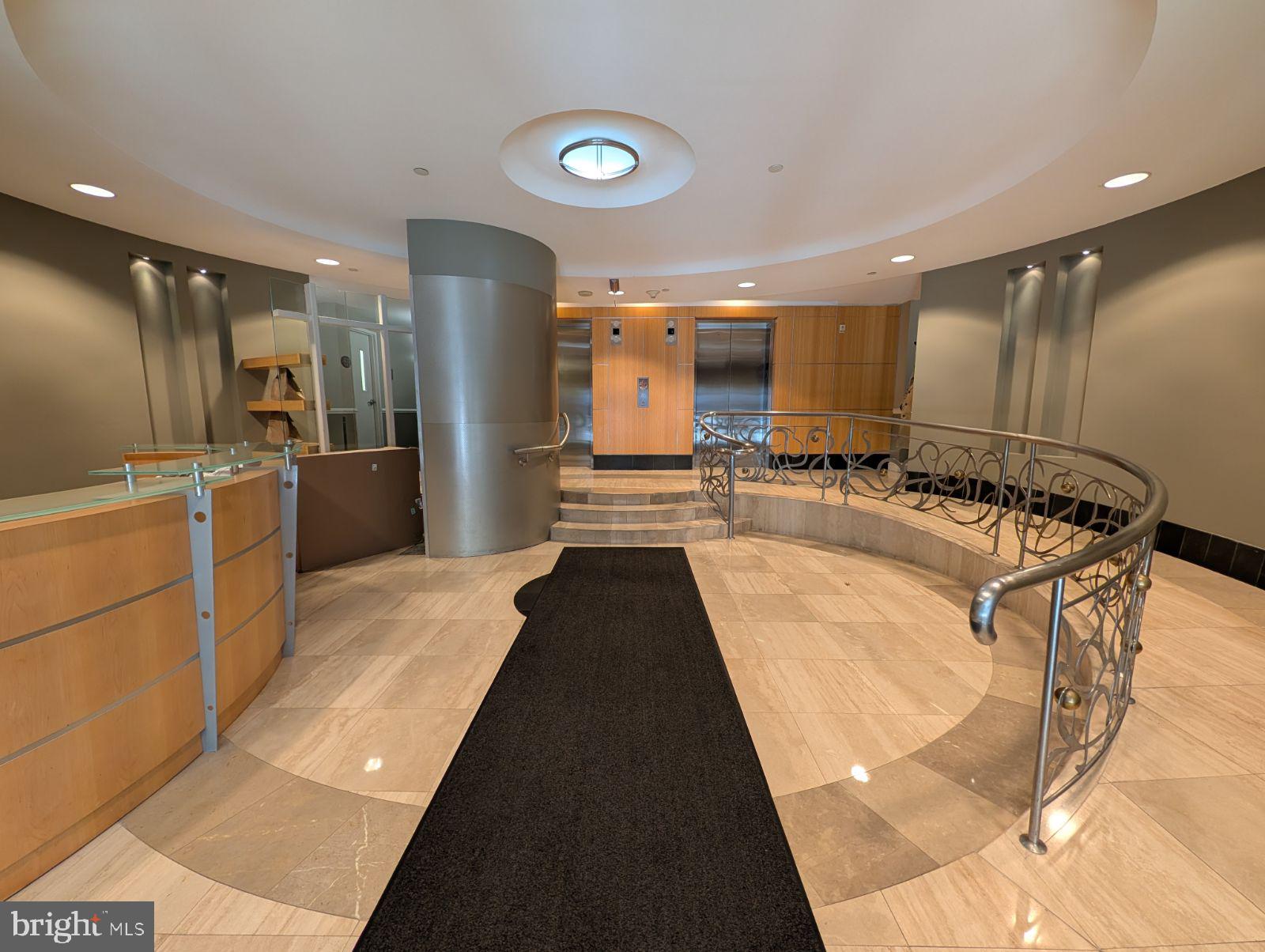 1111 11th Street Northwest, Unit 308 Washington, DC 20001 - Photo 44 of 47 a view of a kitchen with a sink stainless steel appliances and cabinets