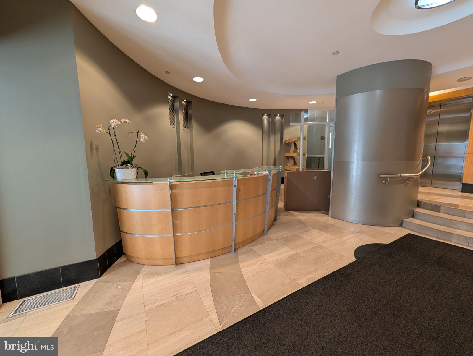 1111 11th Street Northwest, Unit 308 Washington, DC 20001 - Photo 45 of 47 a kitchen with stainless steel appliances a refrigerator and a sink