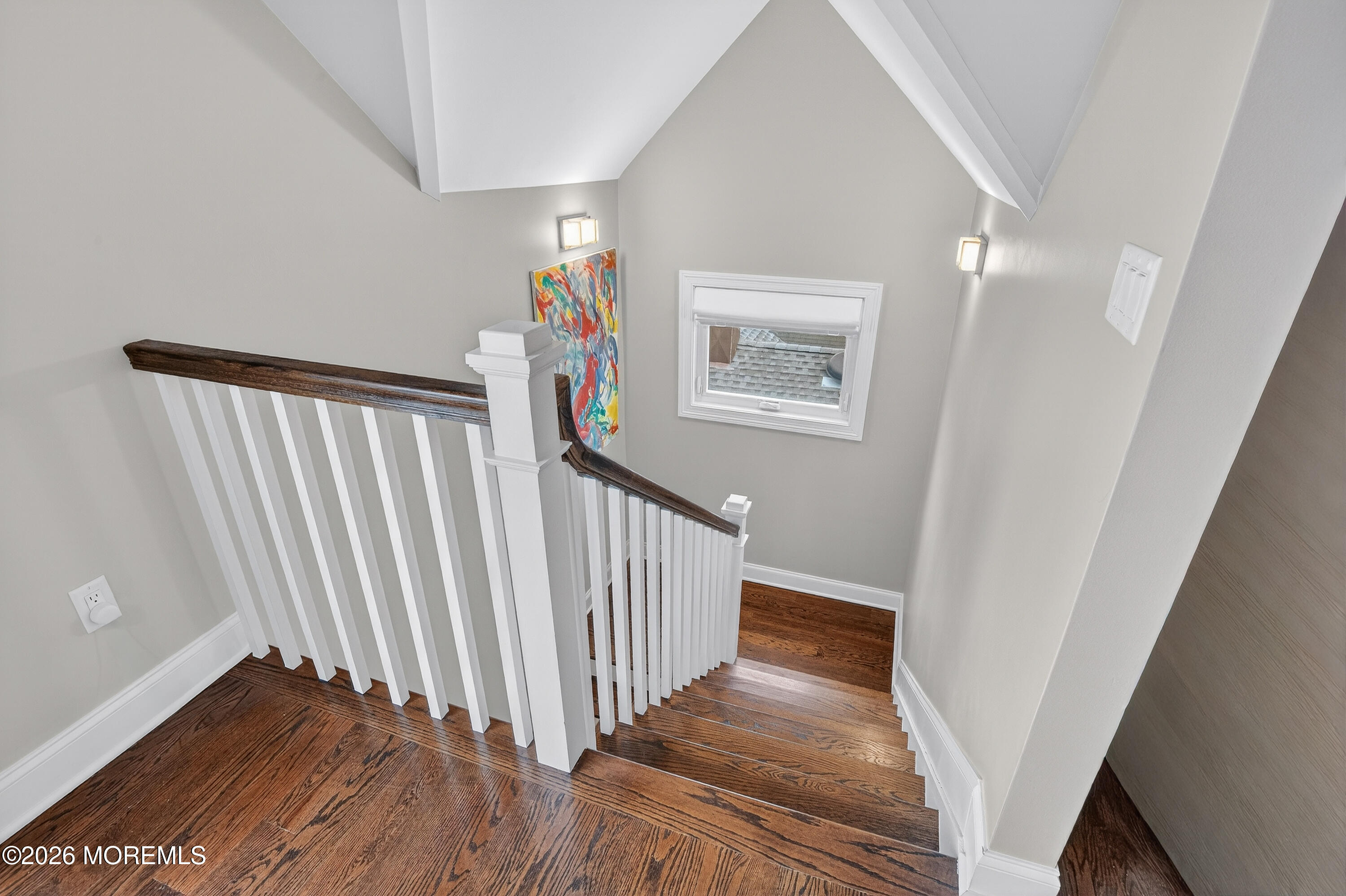 27 5th Street Highlands, NJ 07732 - Photo 27 of 62 a view of a hallway with wooden floor and staircase