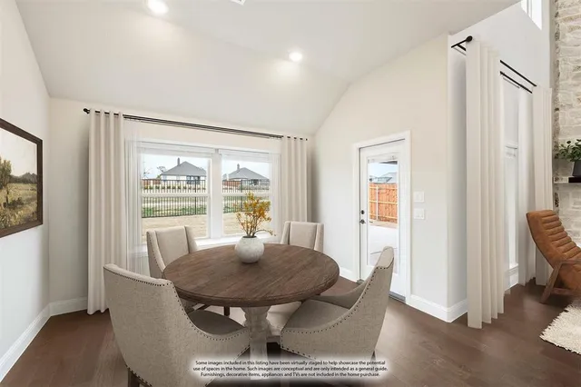 a dining room with furniture and window