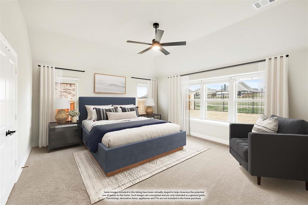 4021 Eagles Bluff Road Midlothian, TX 76065 - Photo 16 of 40 a spacious bedroom with a large bed and a couch