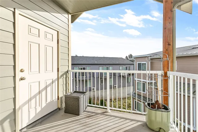 a view of a brick wall with a large window