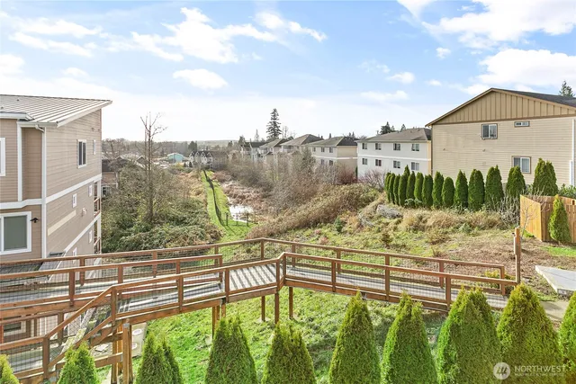 a view of a balcony with city view