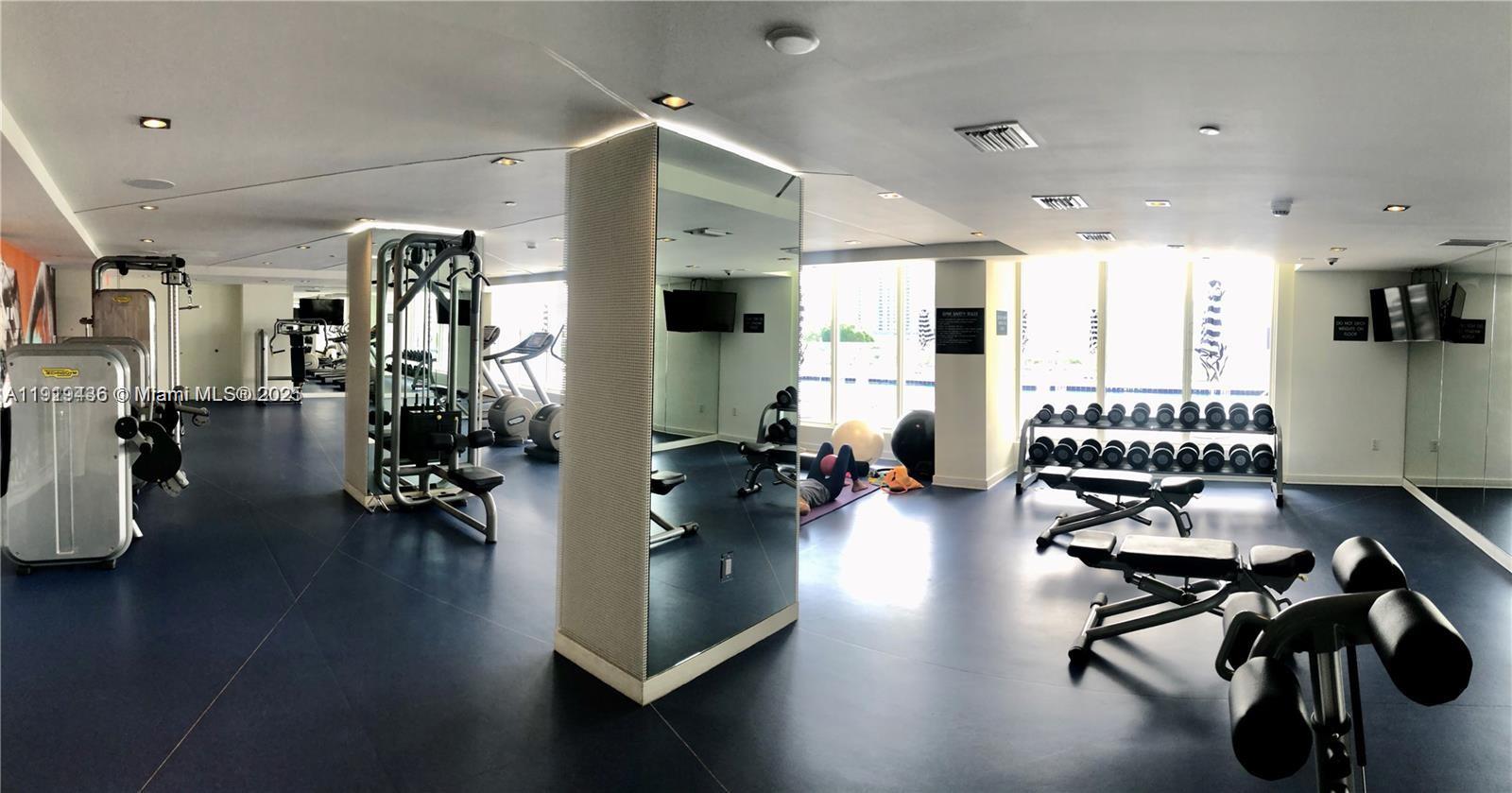 4250 Biscayne Boulevard, Unit 1601 Miami, FL 33137 - Photo 16 of 19 a view of a room with gym equipment