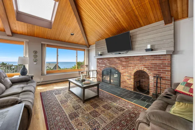 a view of a balcony dining table and chairs