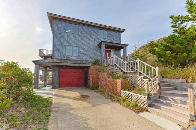 a utility room with sink dryer and washer