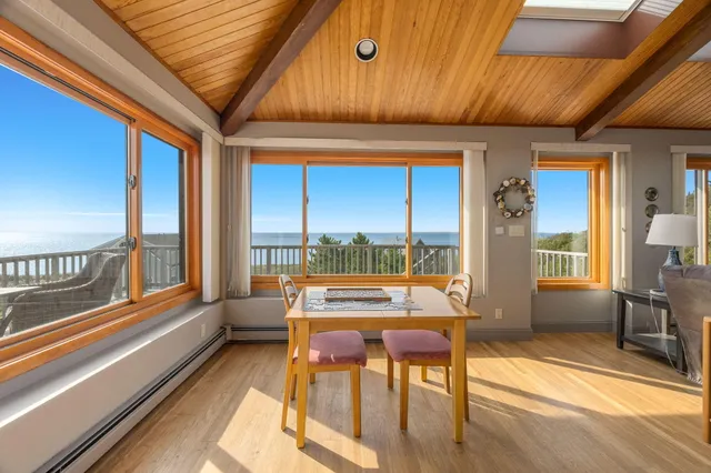 a kitchen with stainless steel appliances granite countertop sink stove and cabinets