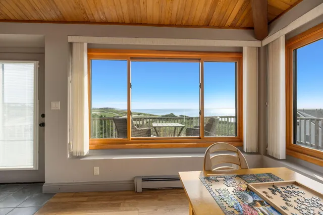 a workspace with furniture and window