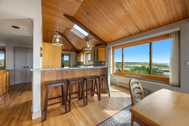 a bathroom with a glass door shower