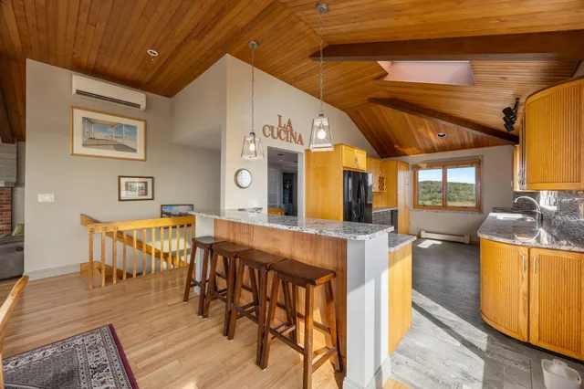 a view of a balcony with furniture