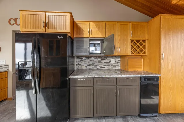 a view of a street with an ocean view