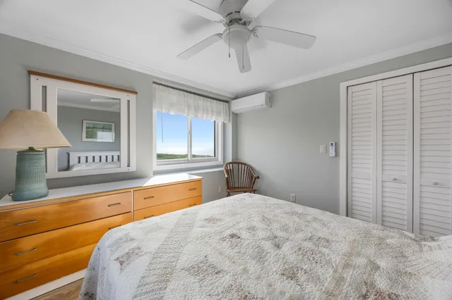 a view of a balcony with furniture