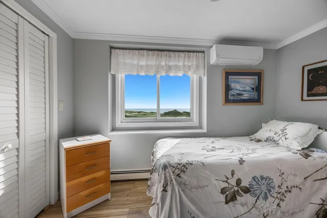 a bathroom with a granite countertop sink mirror and shower