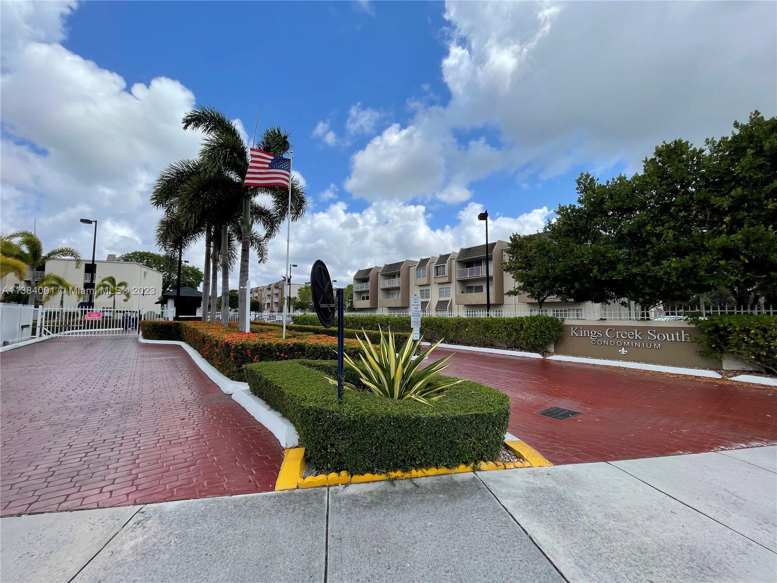 7765 Southwest 86th Street, Unit F2412 Miami, FL 33143 - Photo 5 of 53 a view of a backyard