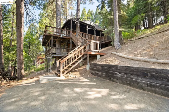 a house with trees in front of it