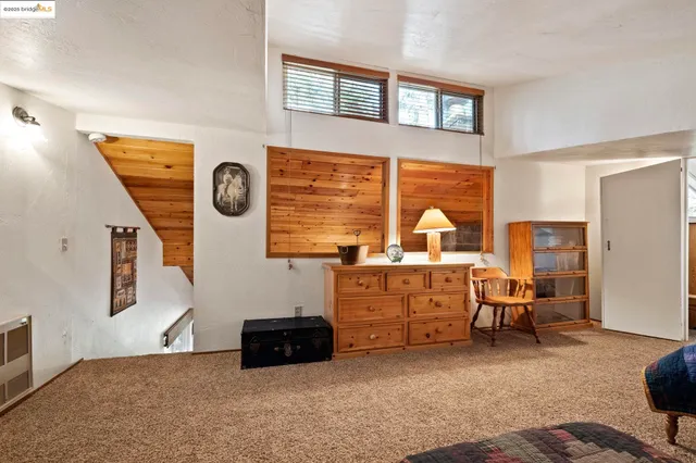 a room with furniture and a window