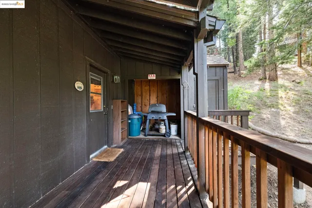 a view of a balcony with chairs