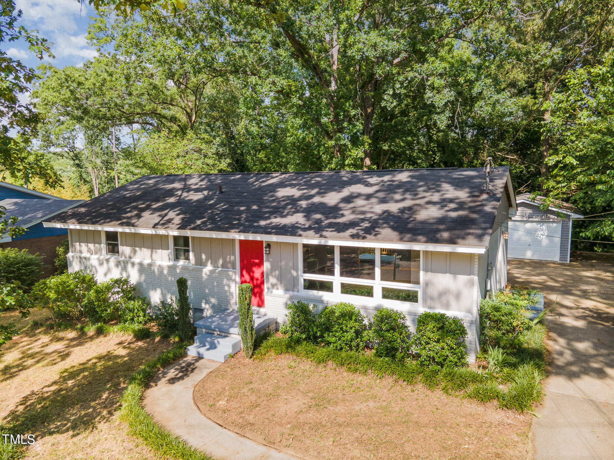3528 Brentwood Road Raleigh, NC 27604 - Photo 1 of 17 front view of a house with a small yard