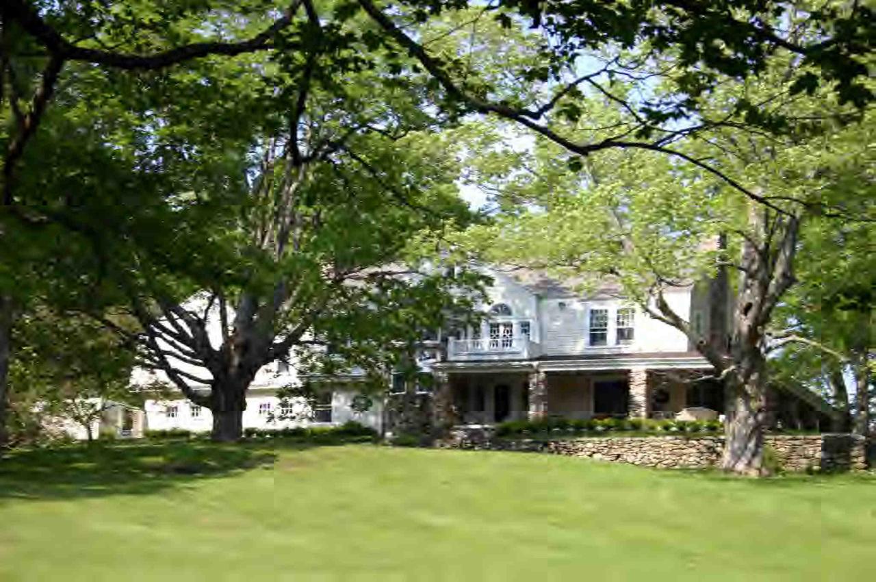 48 Tyringham Road Monterey, MA 01245 - Photo 1 of 8 a front view of house with yard