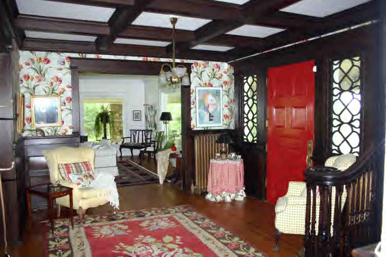 48 Tyringham Road Monterey, MA 01245 - Photo 5 of 8 a living room with furniture a rug and a chandelier