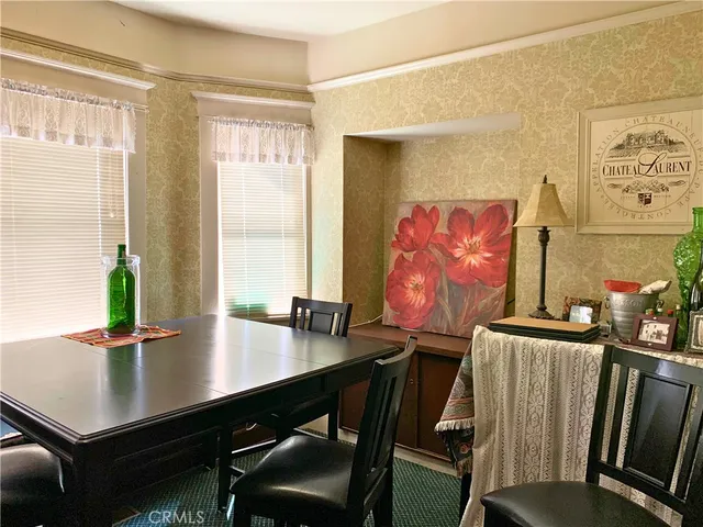 a view of a workspace with furniture