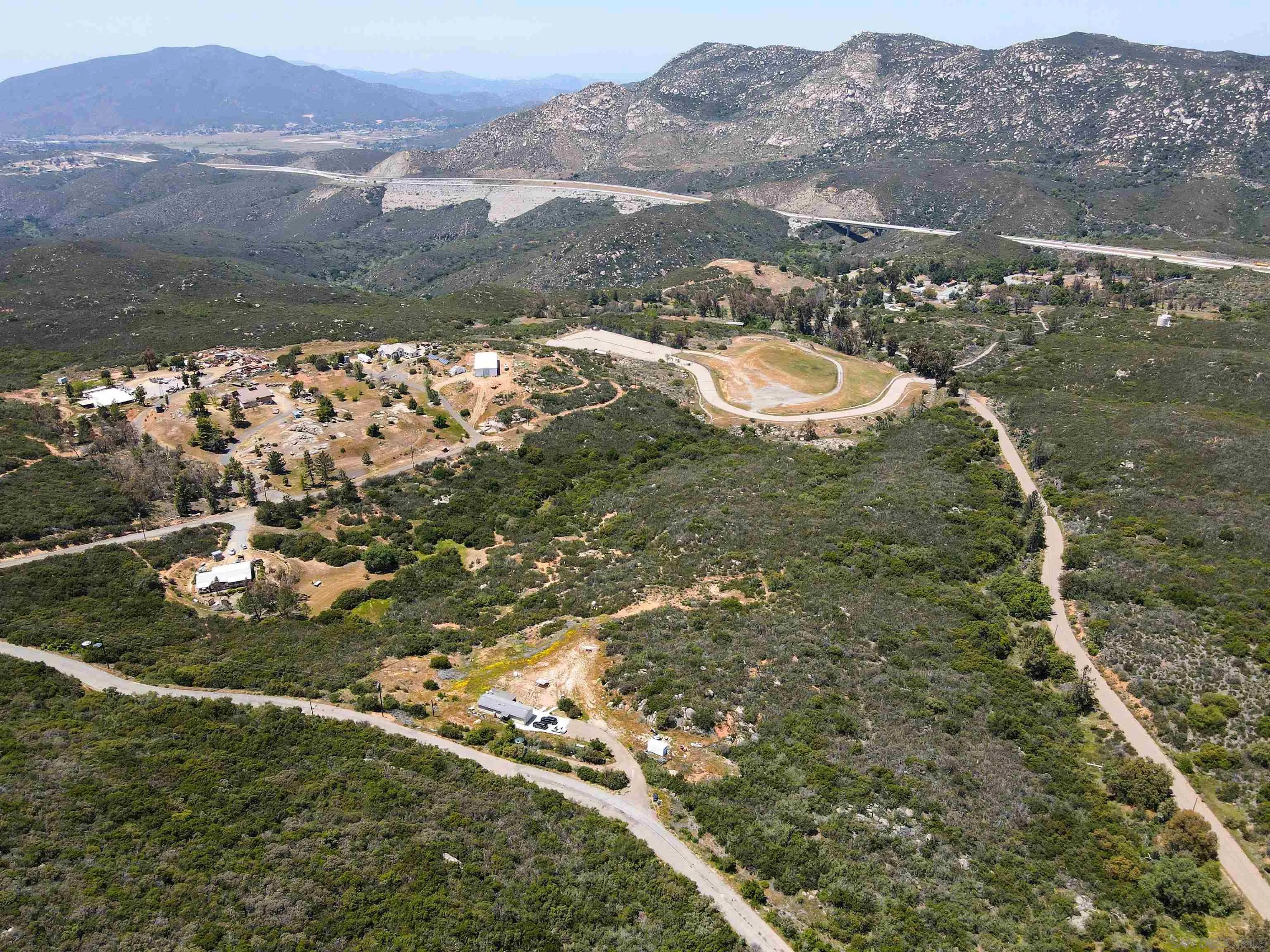 23744 Old Ranch Road Alpine, CA 91901 - Photo 15 of 17 a aerial view of a house with a yard