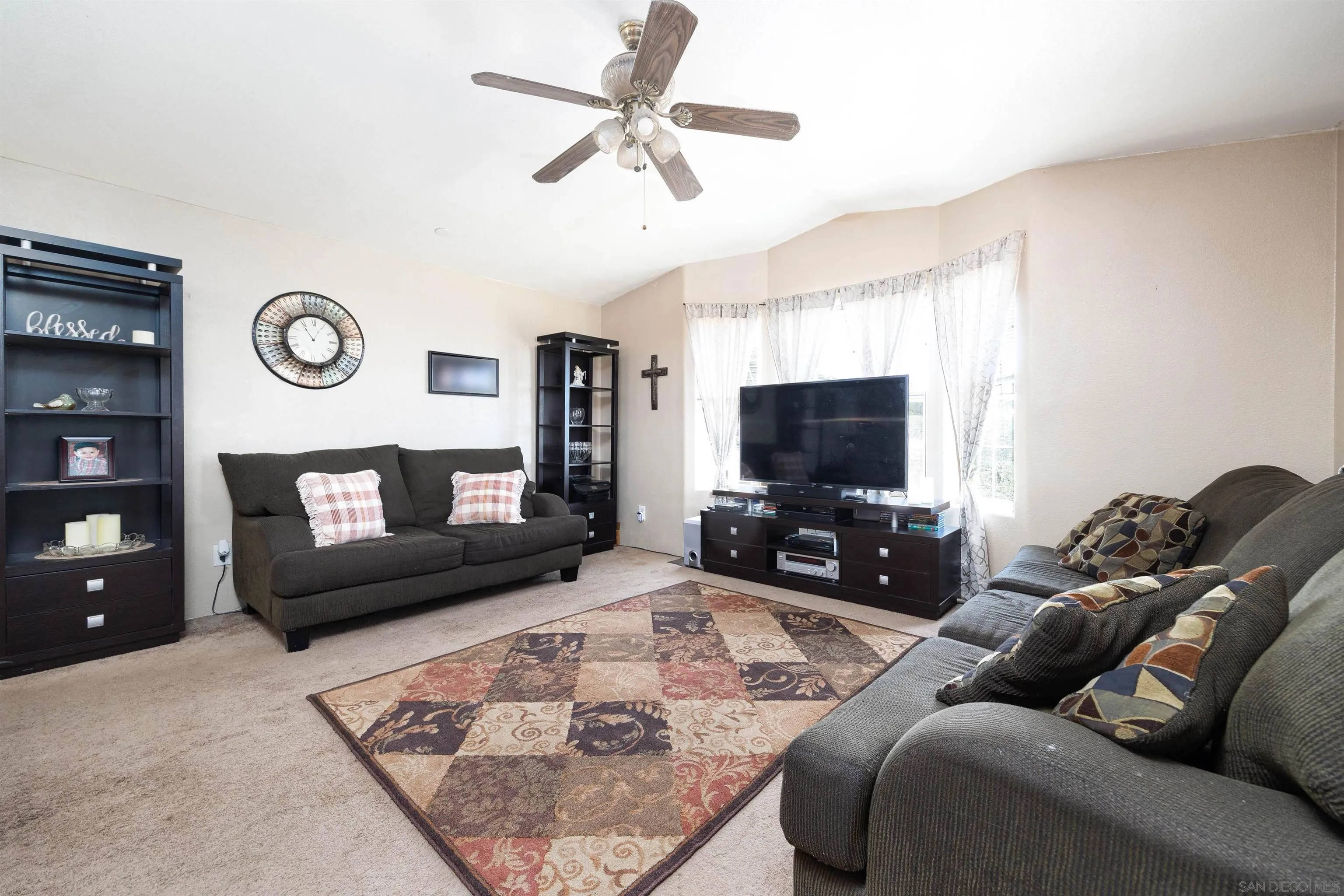 23744 Old Ranch Road Alpine, CA 91901 - Photo 6 of 17 a living room with furniture and a flat screen tv