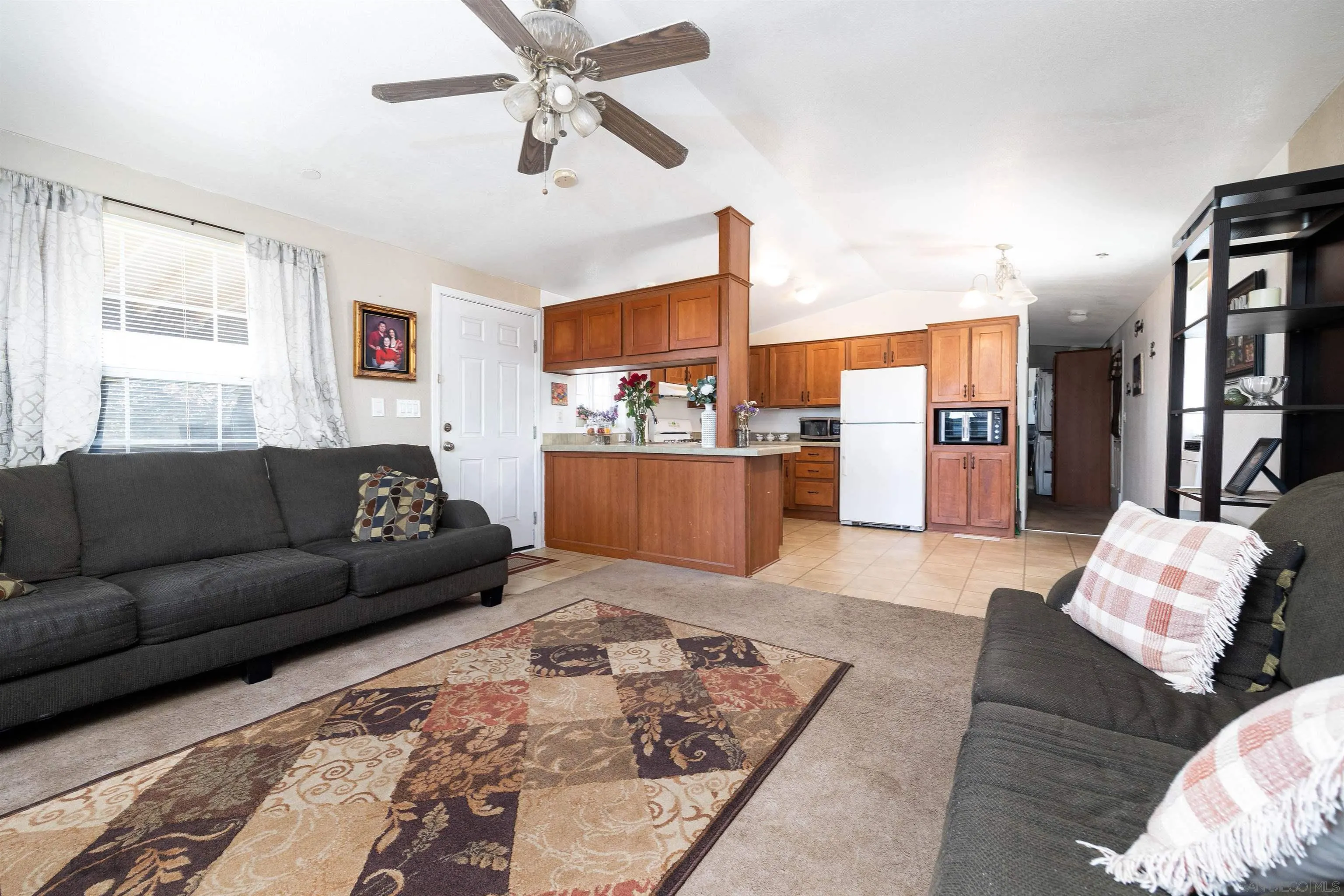 23744 Old Ranch Road Alpine, CA 91901 - Photo 7 of 17 a living room with furniture and a rug