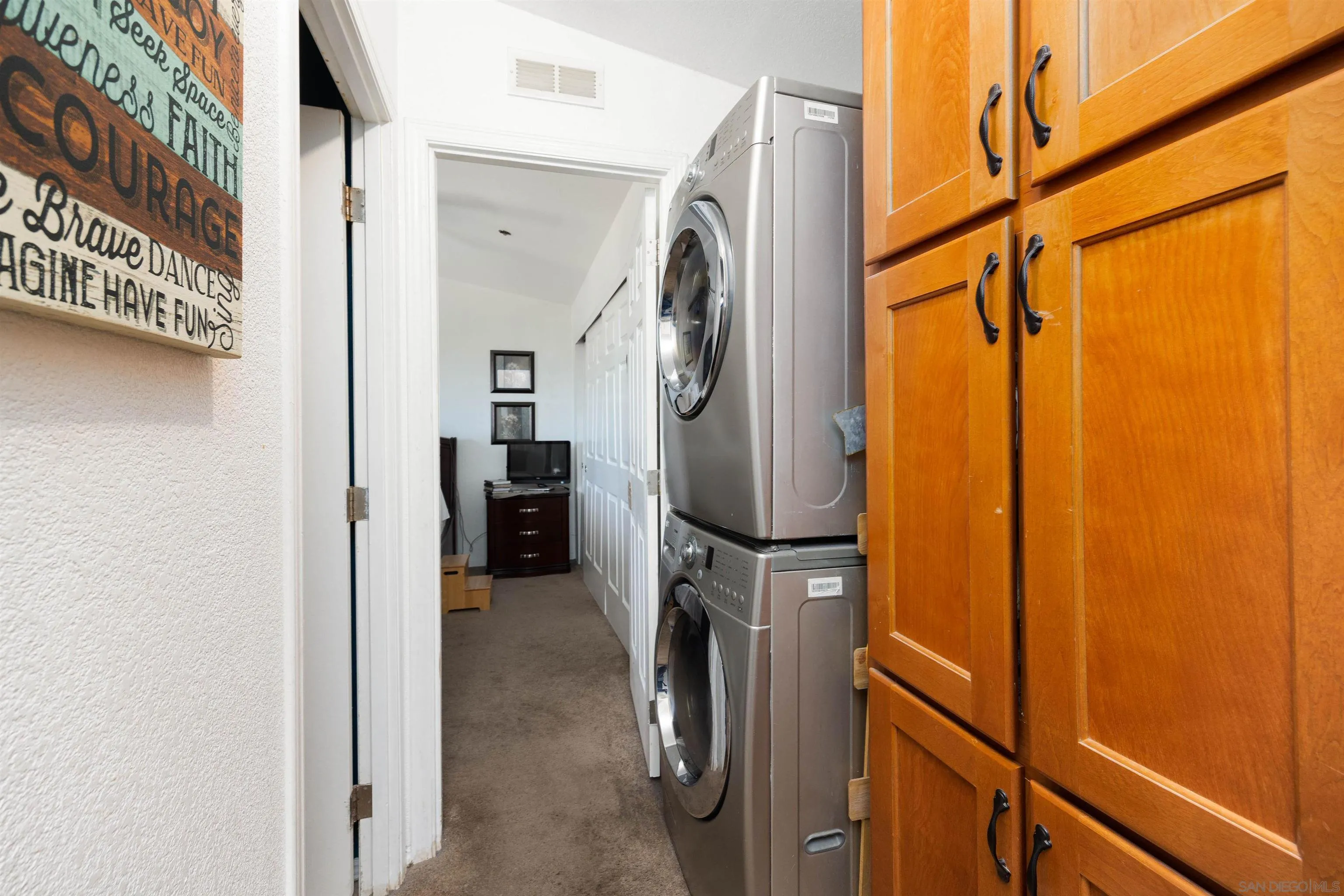 23744 Old Ranch Road Alpine, CA 91901 - Photo 9 of 17 a utility room with window dryer and washer