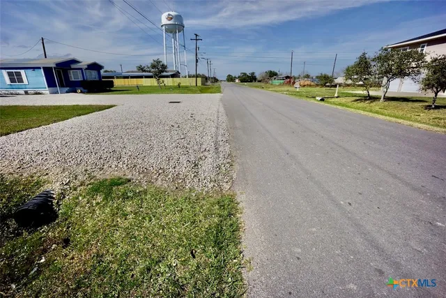 a view of a house with outdoor space and sitting area