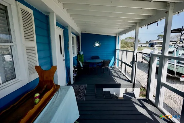a swimming pool with wooden fence