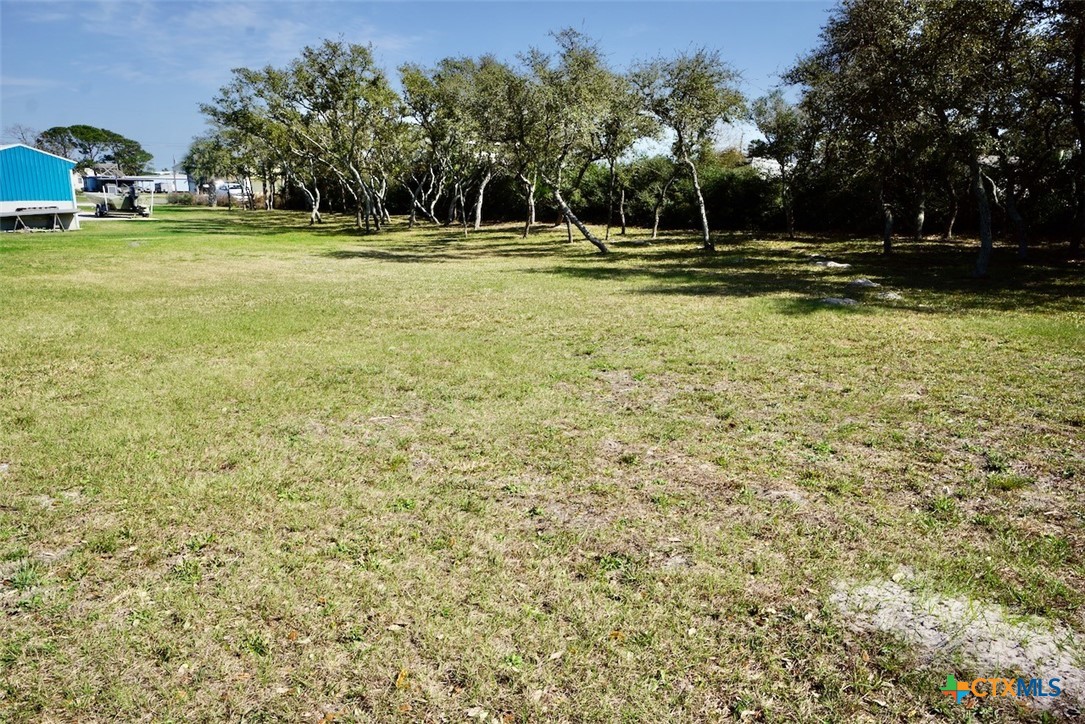 513 16th Street Port O'Connor, TX 77982 - Photo 30 of 35 a view of a park with large trees