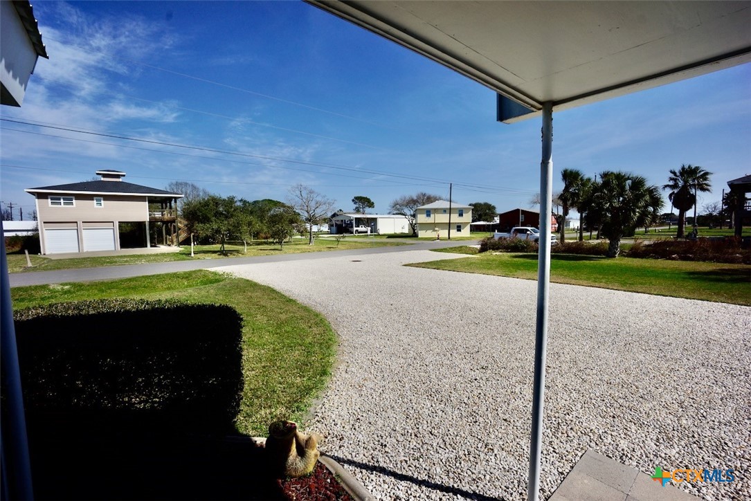 513 16th Street Port O'Connor, TX 77982 - Photo 10 of 35 a view of a house with a yard