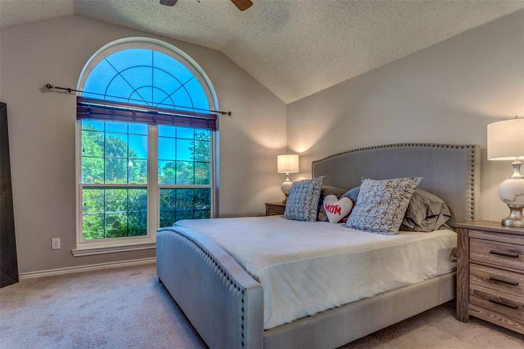 11812 Canoe Road Frisco, TX 75035 - Photo 11 of 31 a bedroom with a bed and a window