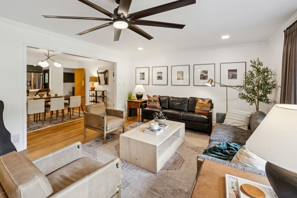 334 Luther Bailey Road Senoia, GA 30276 - Photo 22 of 67 a living room with furniture and a large window