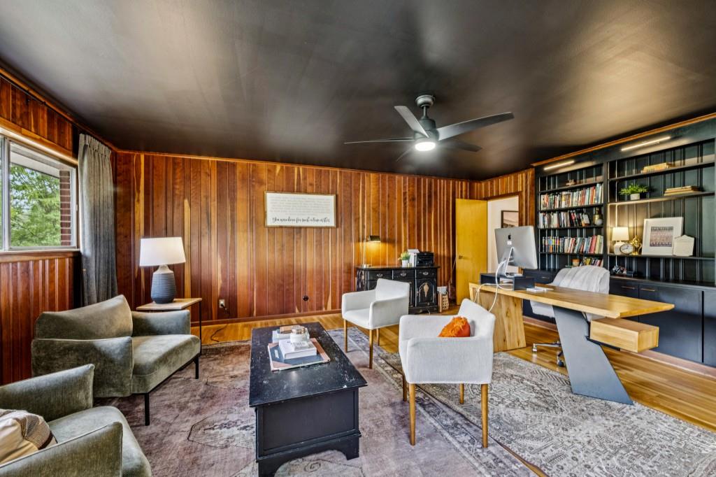 334 Luther Bailey Road Senoia, GA 30276 - Photo 35 of 67 a living room with furniture a table and a large window