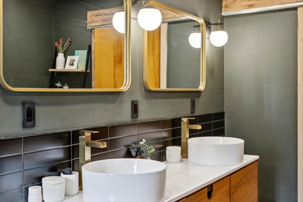 334 Luther Bailey Road Senoia, GA 30276 - Photo 41 of 67 a bathroom with a sink and a mirror