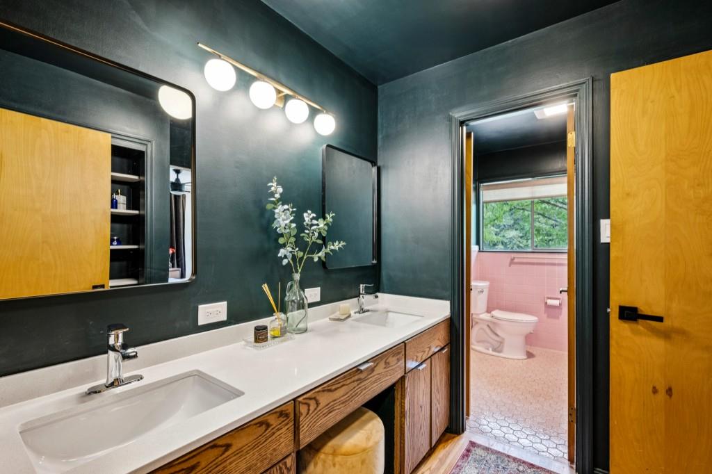 334 Luther Bailey Road Senoia, GA 30276 - Photo 44 of 67 a bathroom with a sink and a mirror