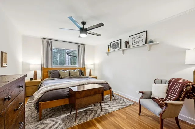 a backyard of a house with outdoor seating