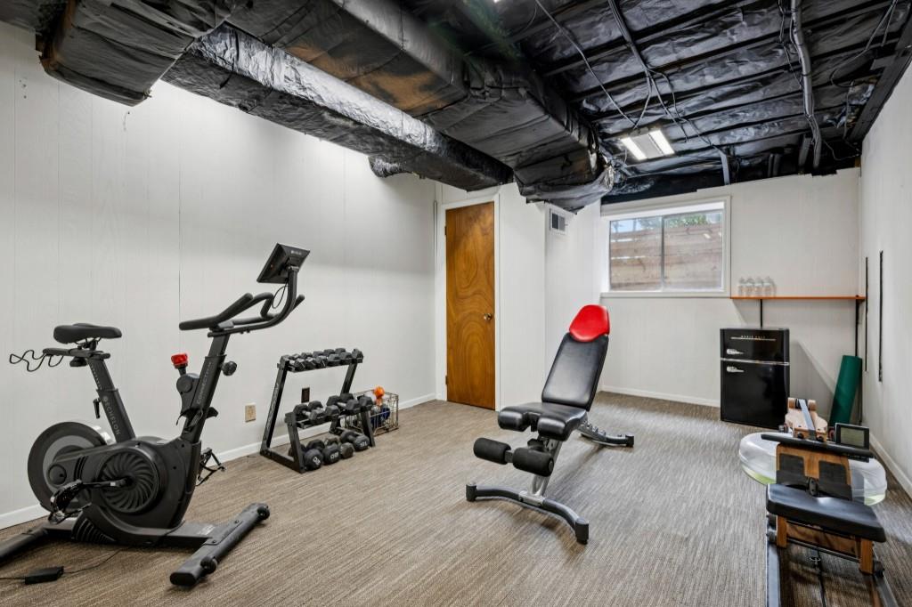 334 Luther Bailey Road Senoia, GA 30276 - Photo 50 of 67 a view of a room with gym equipment