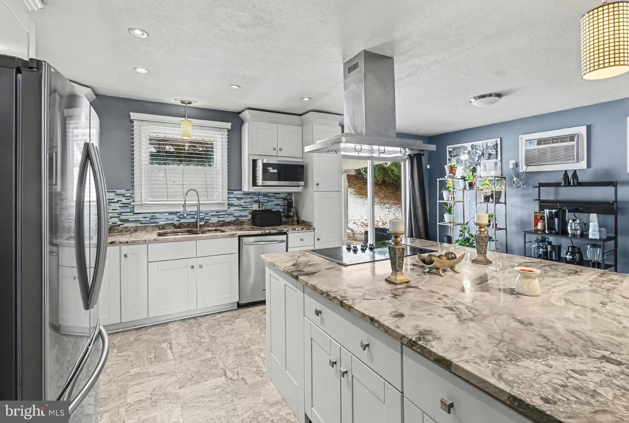 506 Norman Road York, PA 17406 - Photo 12 of 35 Modern kitchen with sleek finishes and style.