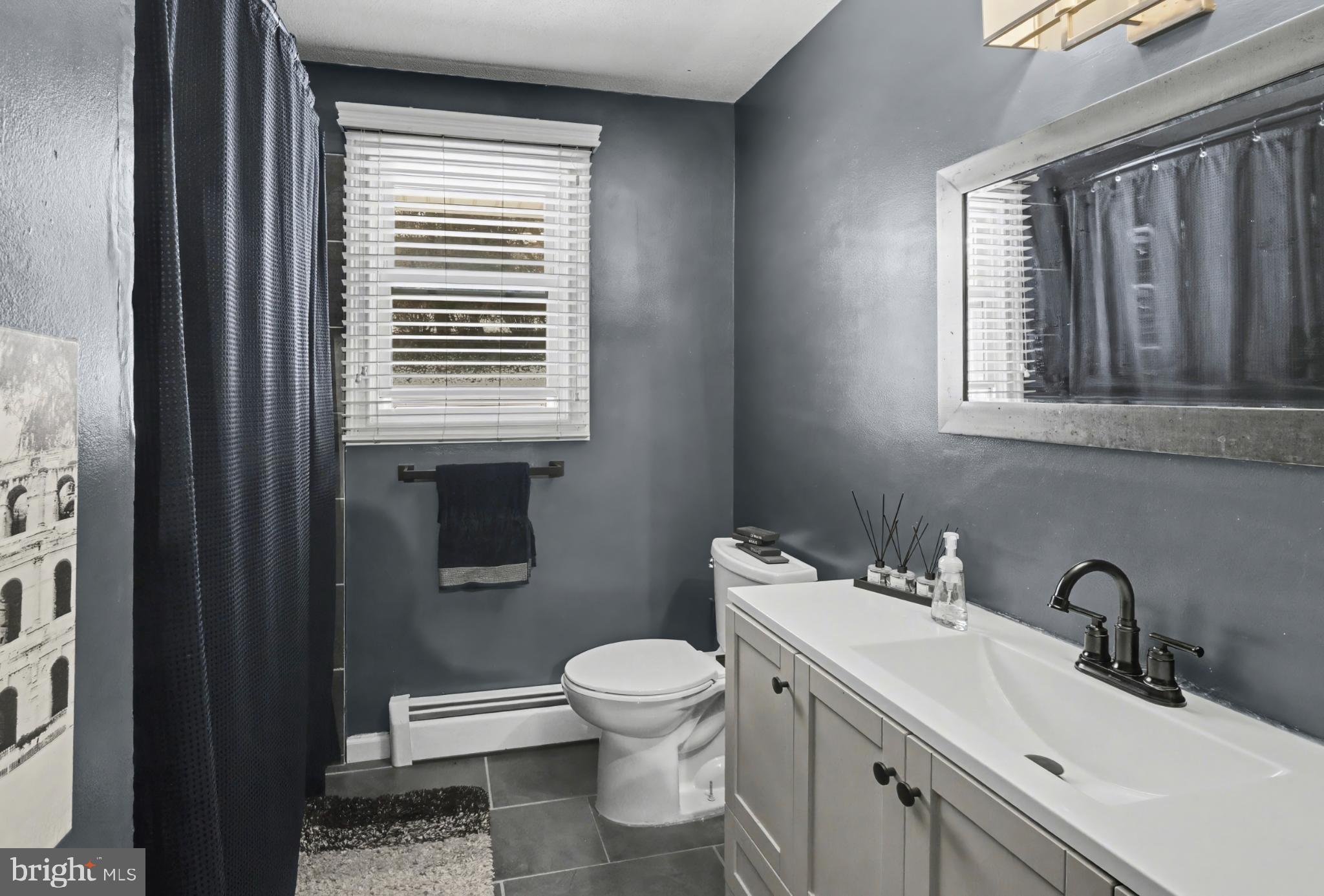 506 Norman Road York, PA 17406 - Photo 15 of 35 Sleek modern bathroom with stylish accents.