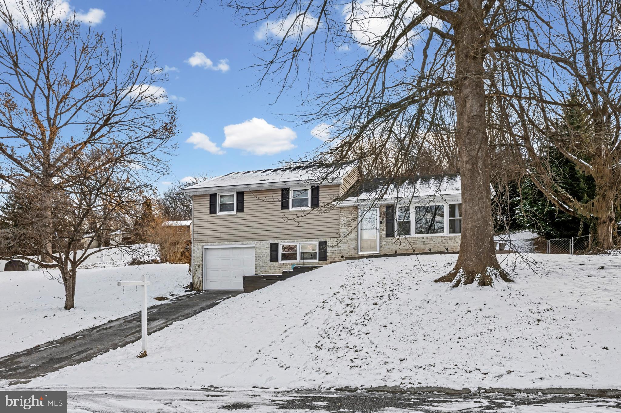 506 Norman Road York, PA 17406 - Photo 2 of 35 Charming home nestled in a winter landscape.